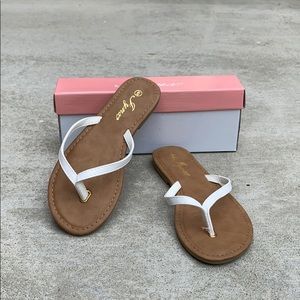 White strappy sandals